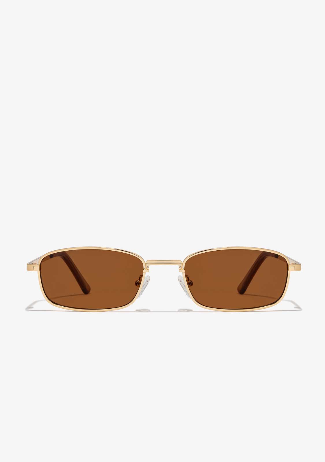 A pair of square-framed sunglasses with a metallic gold finish and amber brown lenses.