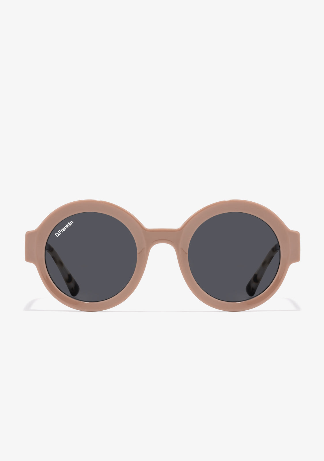 Round-rimmed sunglasses with shiny tan frame and smoke-colored lenses, featuring a logo on the temples and an emblem on the lens.